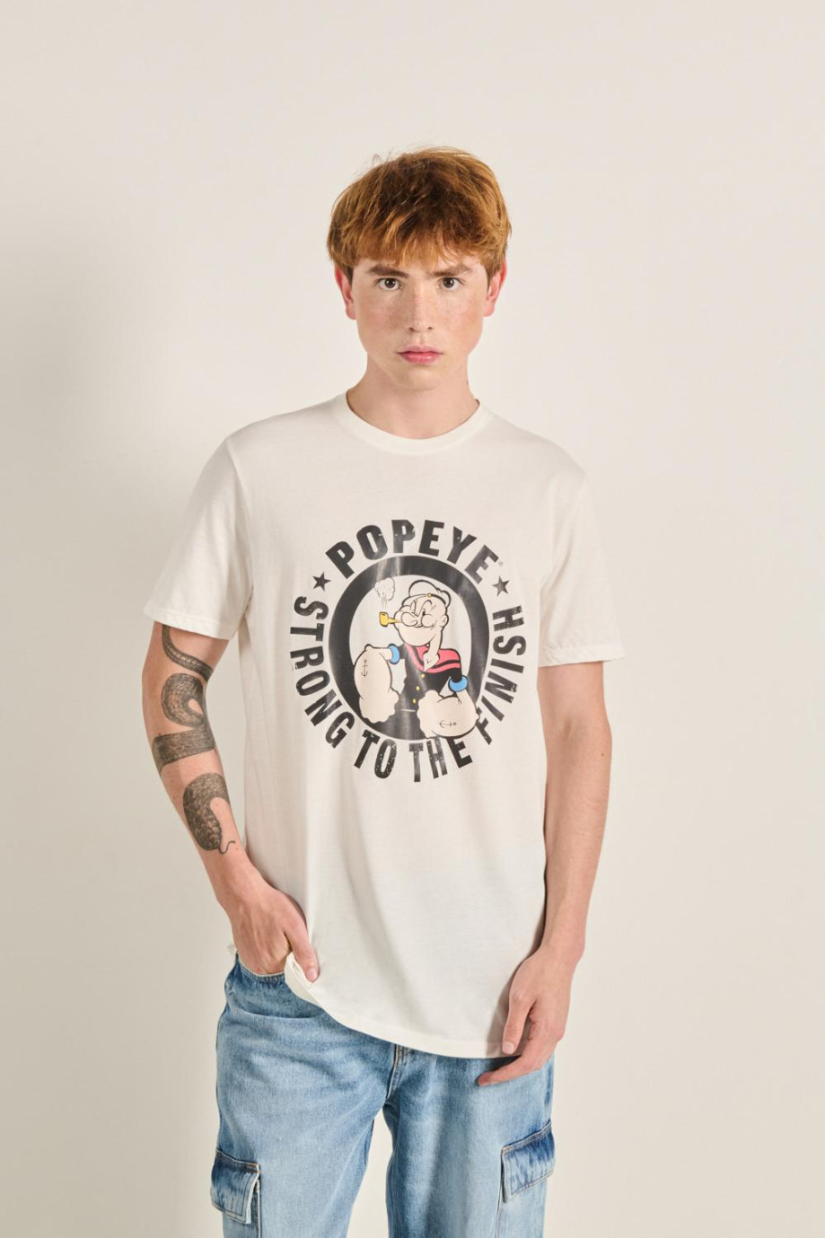 Camiseta unicolor manga corta y diseño en frente de Popeye