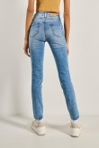 Jean jegging tiro alto azul ajustado con desgastes sutiles