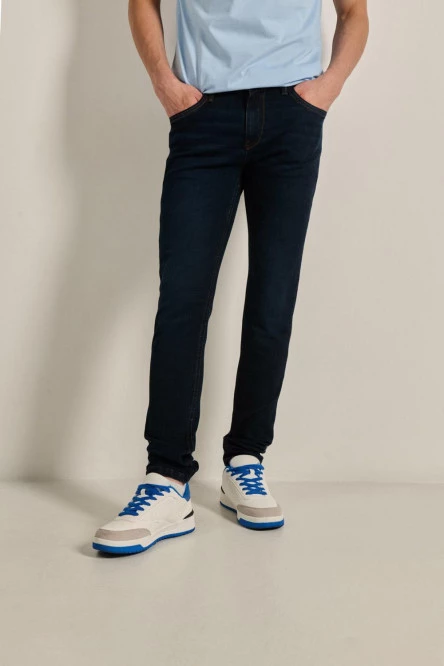 Jean skinny ajustado azul intenso con bolsillos y tiro bajo