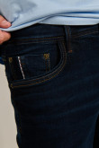 Jean skinny ajustado azul intenso con bolsillos y tiro bajo