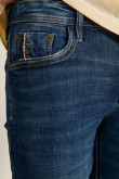 Jean skinny tiro bajo azul oscuro ajustado con 5 bolsillos