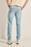 Jean skinny ajustado azul claro con 5 bolsillos y tiro bajo