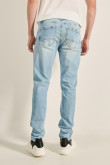 Jean ajustado skinny azul claro con tiro bajo y desgastes