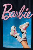 Camiseta unicolor con estampado de Barbie y cuello redondo