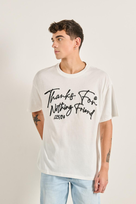 Camiseta unicolor oversize con manga corta y texto estampado