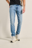 Jean azul claro skinny tiro bajo con bolsillos y desgastes