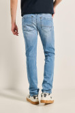 Jean skinny tiro bajo azul con desgastes y ajuste ceñido