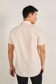 Camisa unicolor con bolsillo en frente y cuello sport collar