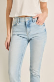 Jean jegging tiro alto azul con desgastes y ajuste ceñido