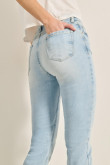 Jean jegging tiro alto azul con desgastes y ajuste ceñido