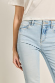 Jean jegging tiro alto azul con desgastes y ajuste ceñido