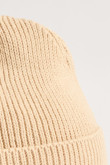 Gorro tejido crema claro con sol bordado en frente