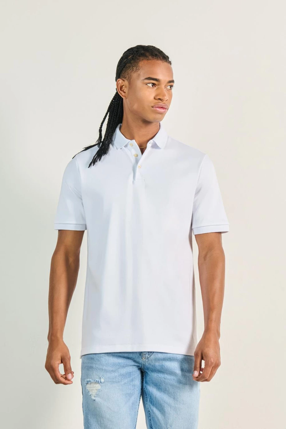 Camiseta unicolor polo con manga corta y botones