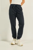 Pantalón unicolor jogger con vena decorativa y bolsillos