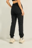 Pantalón unicolor jogger con vena decorativa y bolsillos