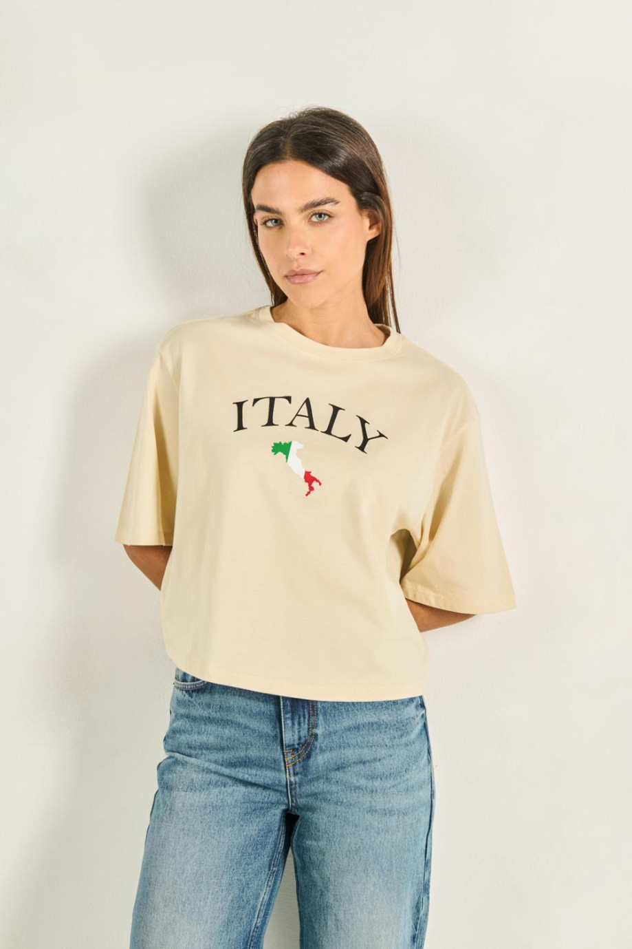 Camiseta oversize crop top kaki con arte college de Italia