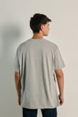 Camiseta unicolor oversize con hombro rodado y manga corta