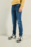 Jean azul oscuro skinny tiro bajo con bolsillos y desgastes