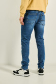 Jean azul oscuro skinny tiro bajo con bolsillos y desgastes