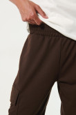 Jogger cargo unicolor ajustado con bolsillos laterales