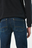 Jean skinny tiro bajo azul oscuro ajustado con 5 bolsillos