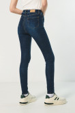 Jean jegging azul oscuro con ajuste ceñido y tiro súper alto