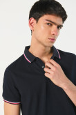 Camiseta unicolor polo con tejido en puños y cuello