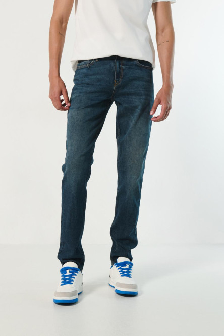 Jean tiro bajo slim azul oscuro con bota semi recta