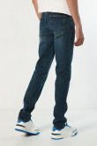 Jean tiro bajo slim azul oscuro con bota semi recta