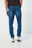 Jean skinny ajustado azul oscuro con tiro bajo y bolsillos