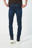 Jean ajustado skinny azul oscuro tiro bajo con 5 bolsillos