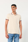 camiseta-unicolor-polo-con-tejido-en-punos-y-cuello