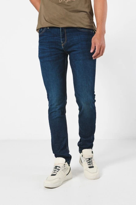 Jean skinny tiro bajo azul oscuro ajustado con cremallera