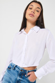 Blusa crop top unicolor con manga larga y botones