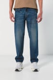 Jean 90´S tiro bajo azul oscuro con bota recta y desgastes