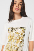 Camiseta oversize unicolor con diseño animal print brillante