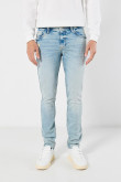 Jean skinny tiro bajo azul claro con rotos localizados