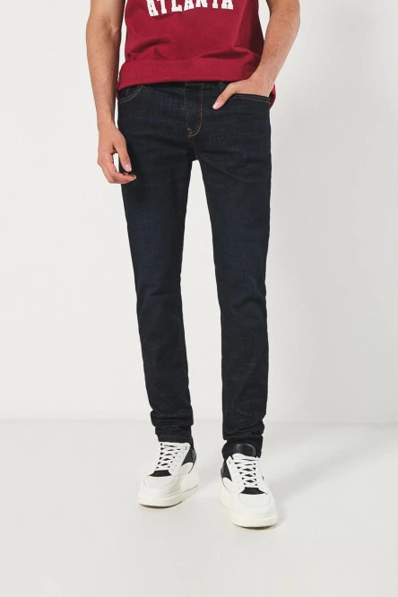 Jean azul skinny tiro bajo con ajuste ceñido y bolsillos