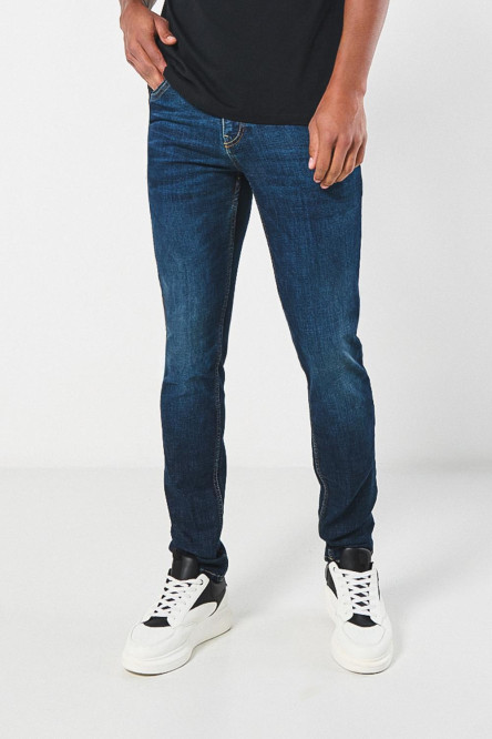 Jean ajustado skinny azul oscuro con bolsillos y tiro bajo