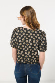 Blusa unicolor crop top estampada con cuello V