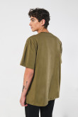 Camiseta unicolor oversize con bolsillo y cuello redondo