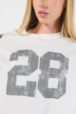 Camiseta oversize crop top crema con diseño college