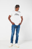 Jean azul skinny tiro bajo con ajuste ceñido y desgastes