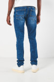 Jean azul skinny tiro bajo con ajuste ceñido y desgastes