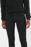 Jean skinny tiro bajo negro con cremallera y bolsillos