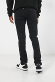 Jean skinny tiro bajo negro con cremallera y bolsillos