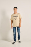 Camiseta oversize unicolor manga corta con texto college