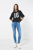 Jean jegging azul tiro alto con ajuste ceñido y desgastes