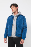 Chaqueta azul oscura bomber con acabados en rib