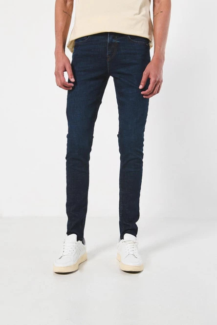 Jean azul intenso súper skinny ajustado con bolsillos